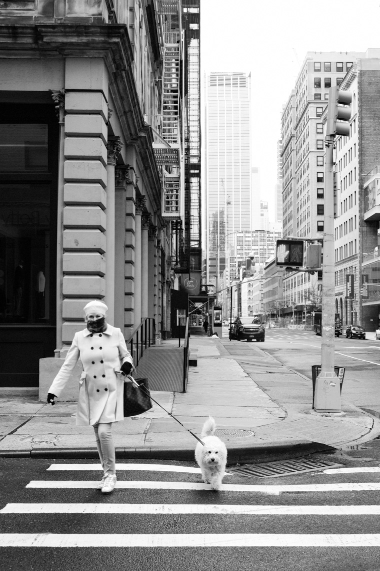 Woman walking dog in Tribeca during pandemic
