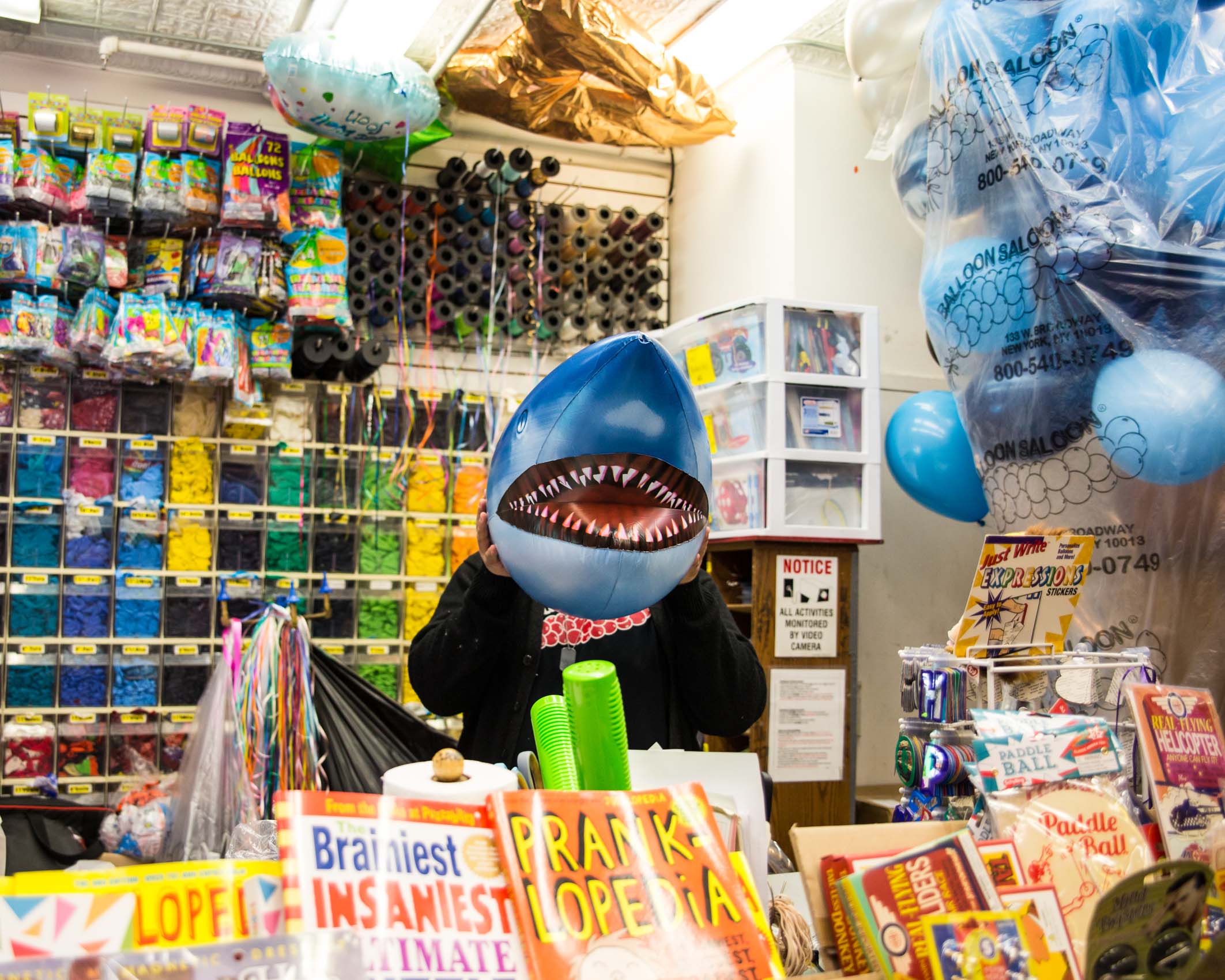 Balloon Saloon employee with shark Tribeca New York